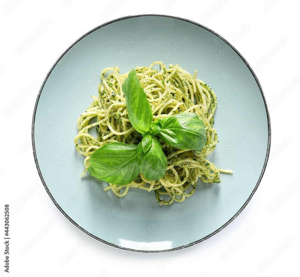 Plate with tasty pesto pasta on white background