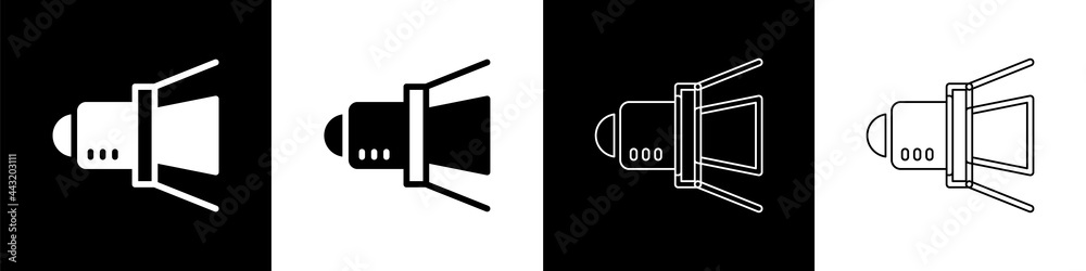 将电影聚光灯图标隔离在黑白背景上。灯光效果。场景，工作室，放映。