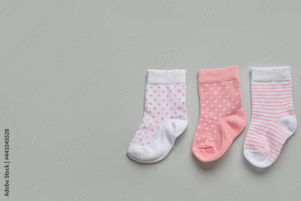 Baby socks on light background