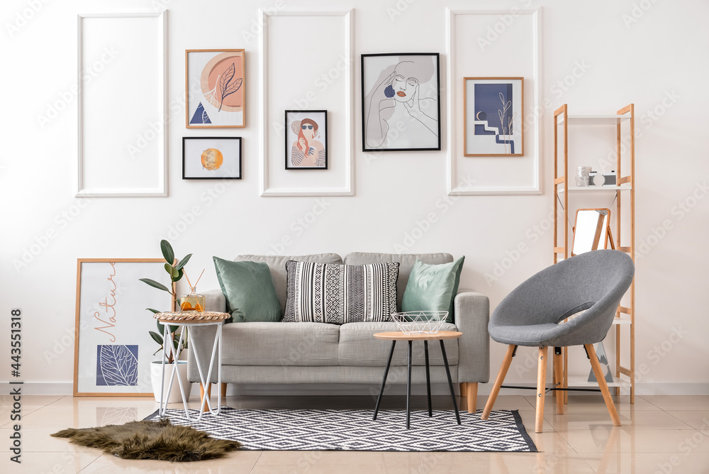 Interior of stylish living room with pictures