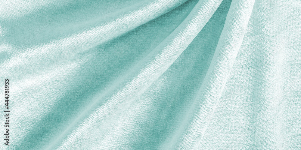 Teal blue velvet background or turquoise green velour flannel texture made of cotton or wool with so