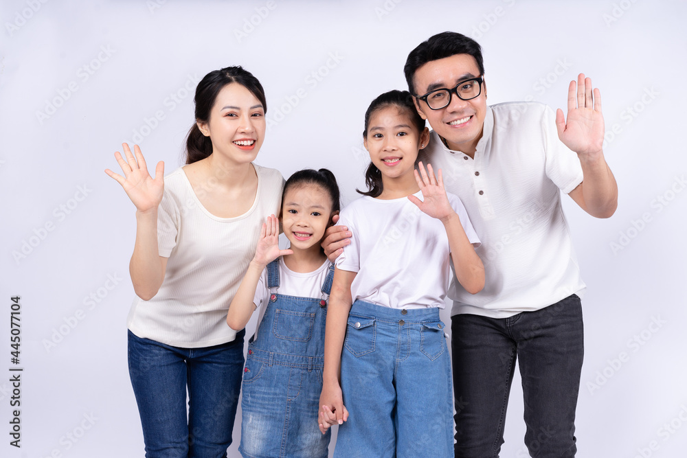 Portrait of Asian family on white background