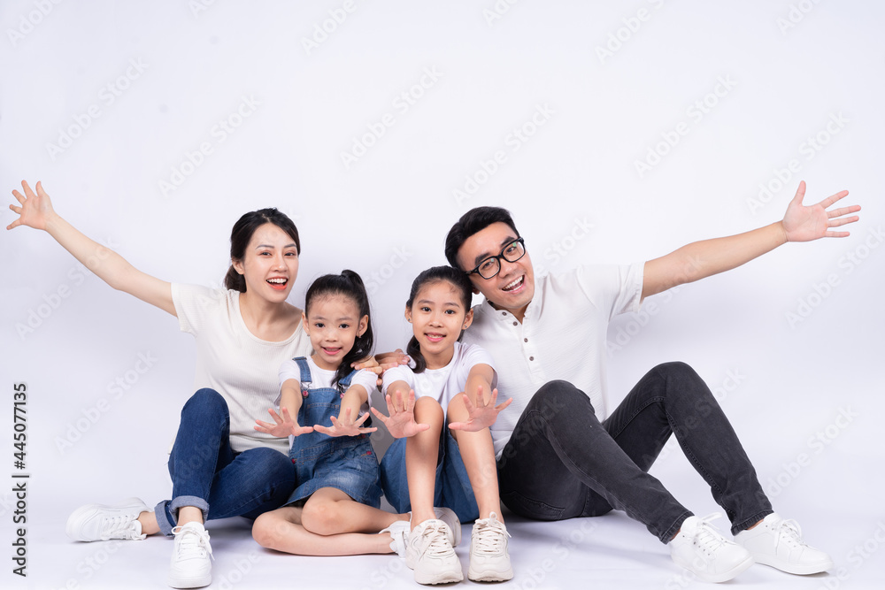 Portrait of Asian family on white background