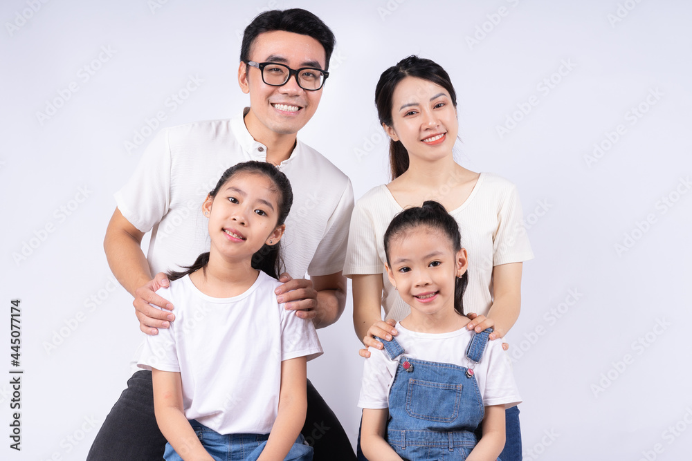 Portrait of Asian family on white background