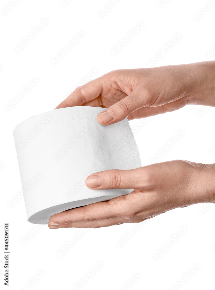 Woman holding roll of toilet paper on white background, closeup