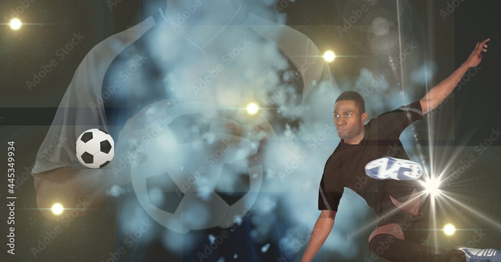 Smoke effect over two male soccer players in different poses against spot of lights