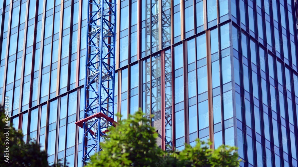 High-rise building under construction. Modern office building. Sunrise.