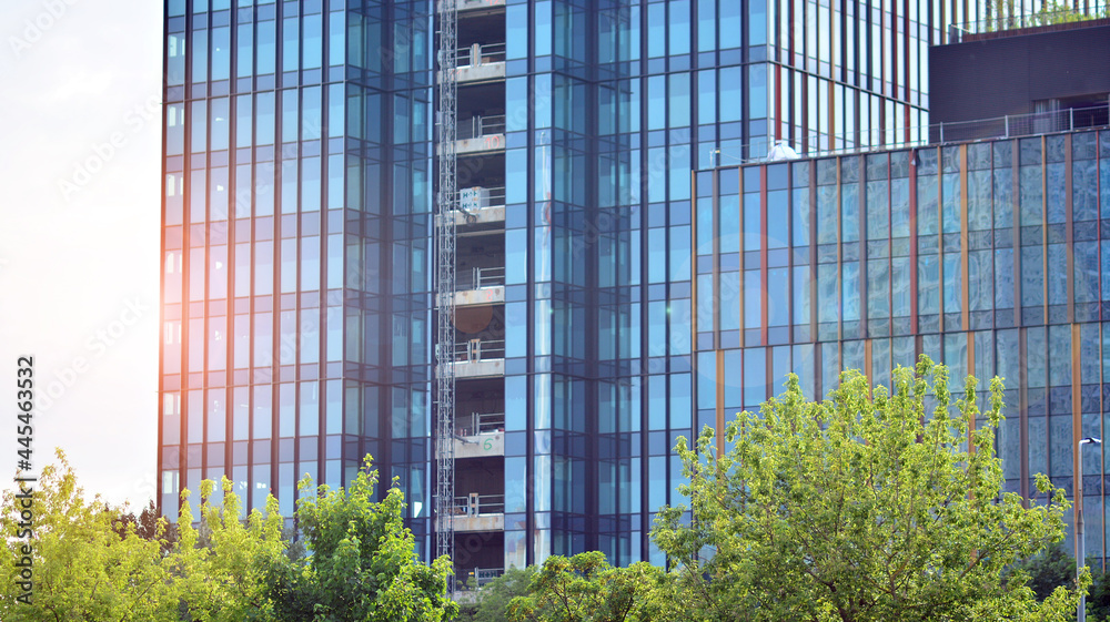 High-rise building under construction. Modern office building. Sunrise.