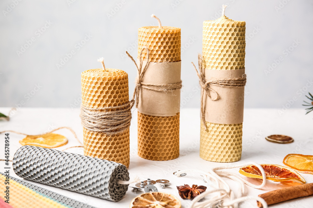 Handmade wax candles on table