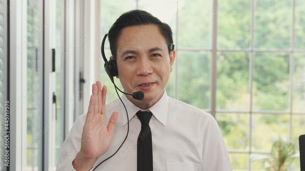 Video call camera view of businessman talks actively in videoconference . Call center, telemarketing