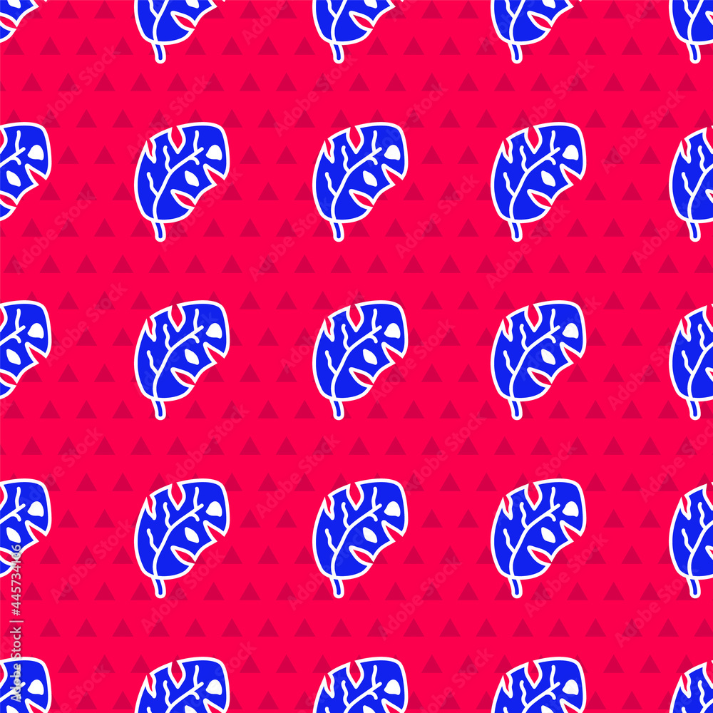 Blue Tropical leaves of palm tree icon isolated seamless pattern on red background. Vector