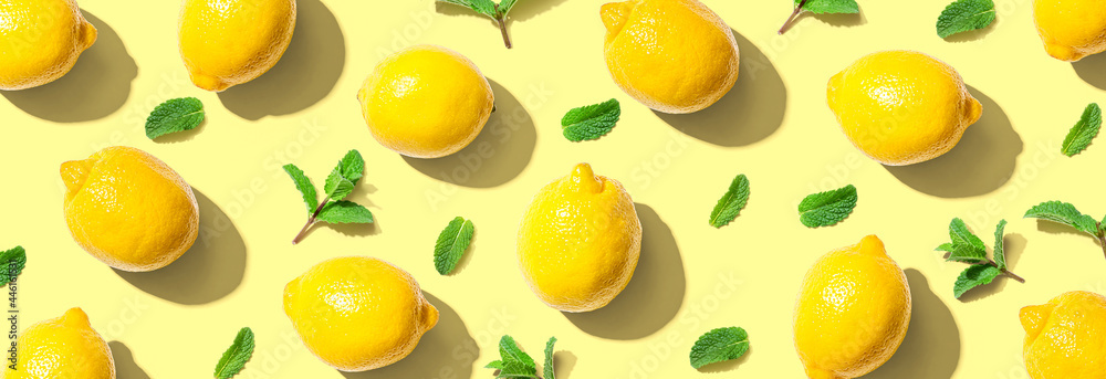 Fresh yellow lemons with mints overhead view