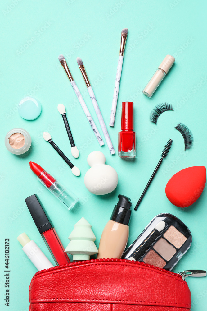 Bag with makeup supplies on color background