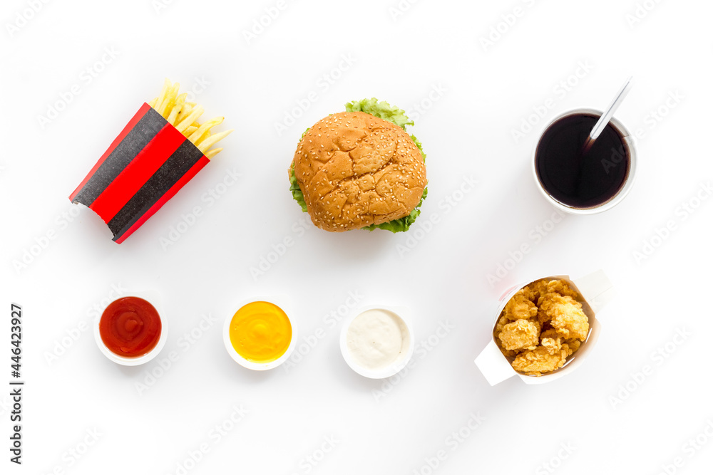 Fast food background. Hamburger chicken nuggets and french fries