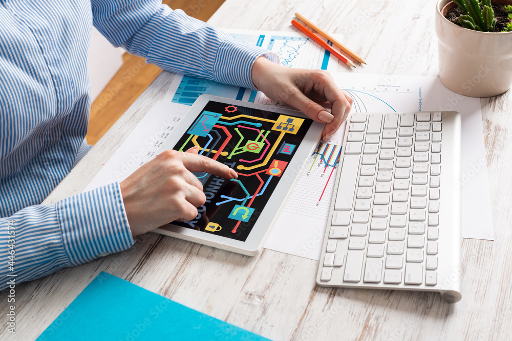 Manager using tablet computer with blank screen