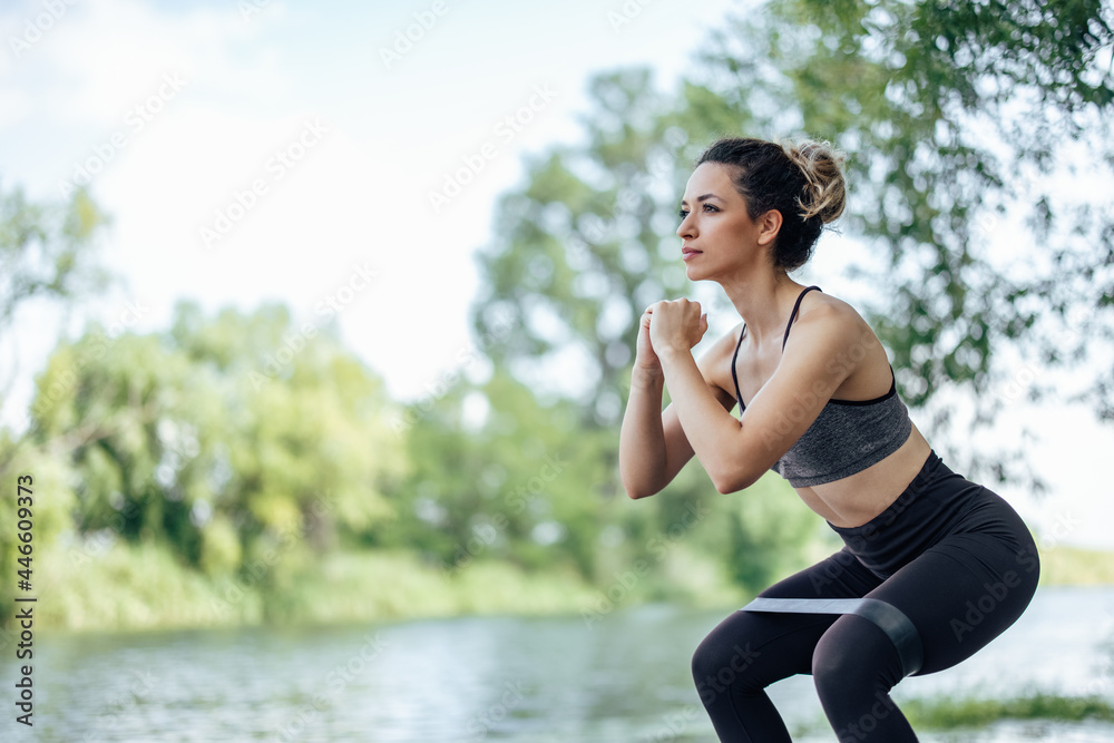 Young woman, pushing her training to the limits.