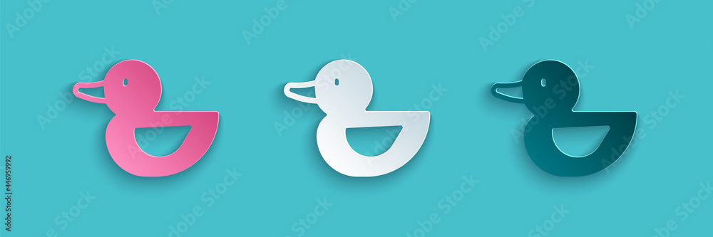 Paper cut Rubber duck icon isolated on blue background. Paper art style. Vector