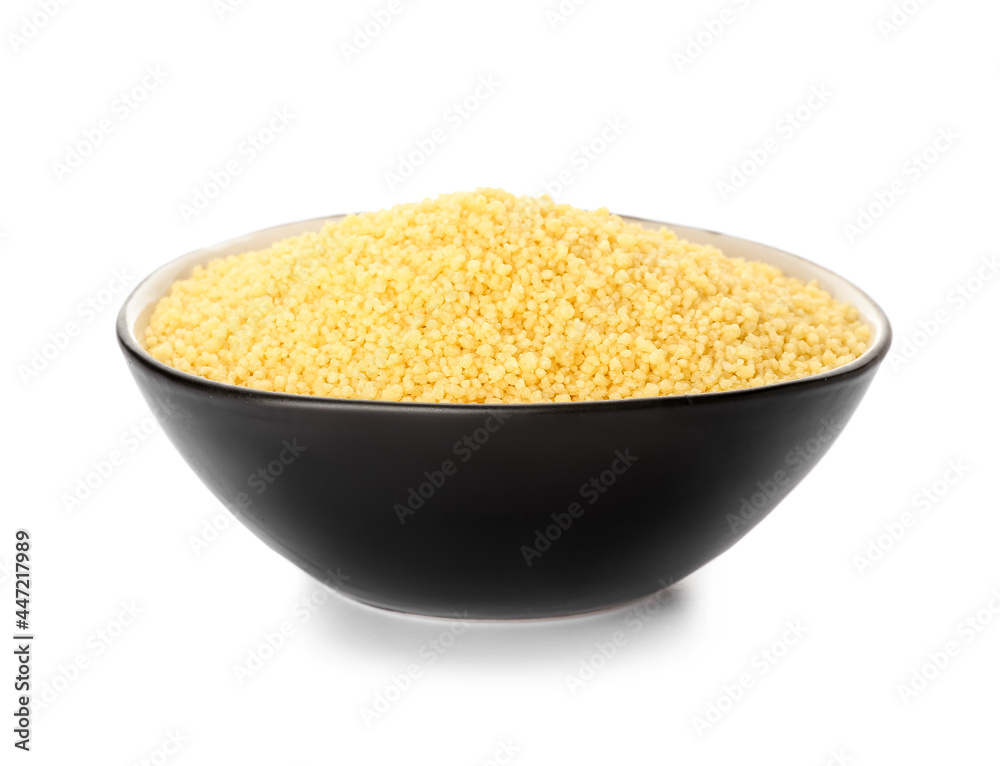 Bowl with raw couscous on white background