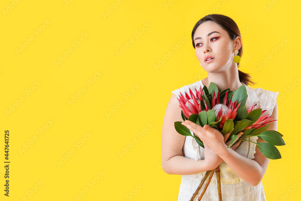 美丽的年轻女子，彩色背景上有千变万化的花朵