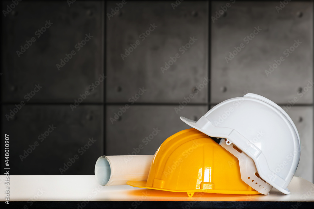 Construction house and building. Repair work. Drawings for building and helmet