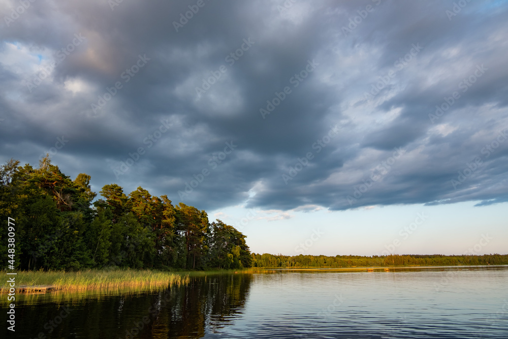 lake asnen in the evening light near ryd, sweden

