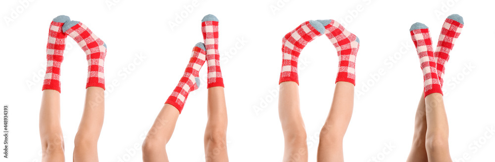 Legs of young woman in socks on white background