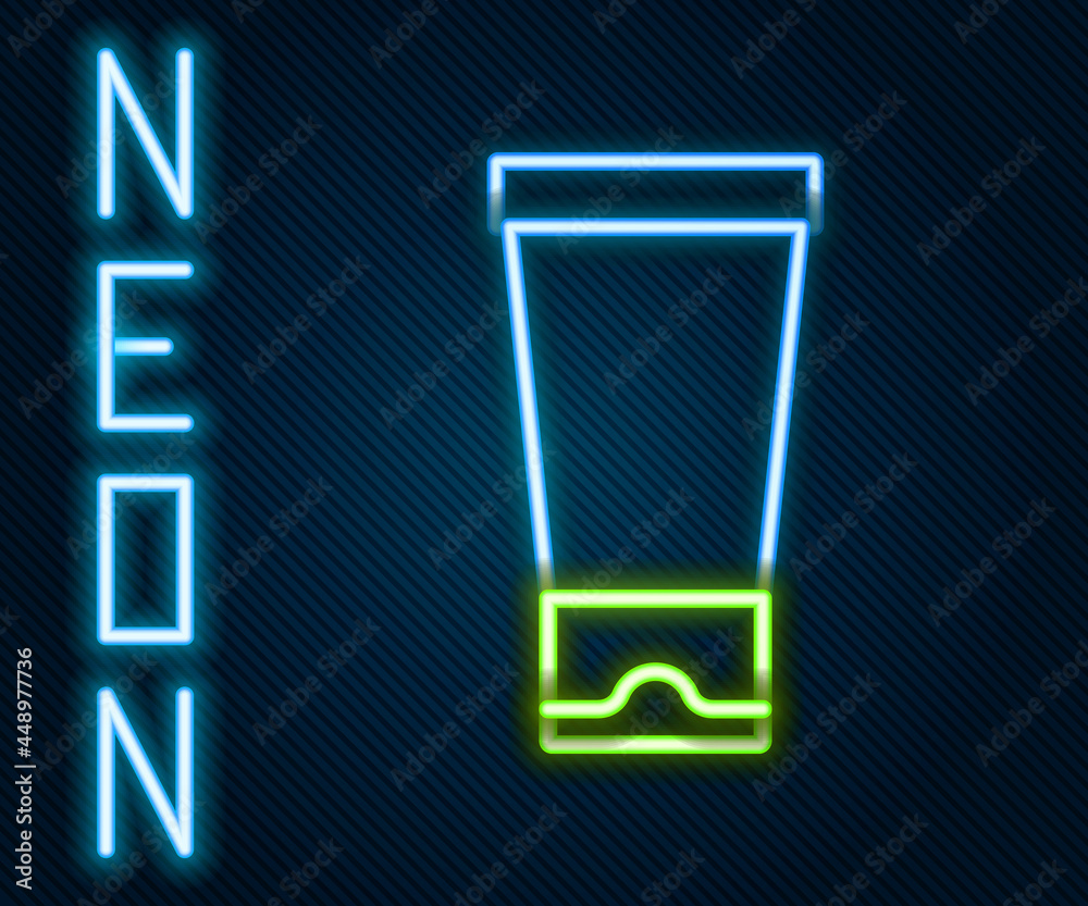 Glowing neon line Cream or lotion cosmetic tube icon isolated on black background. Body care product