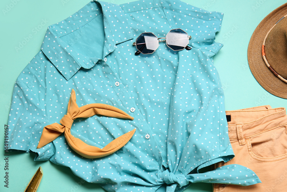 Composition with female clothes and accessories on color background, closeup