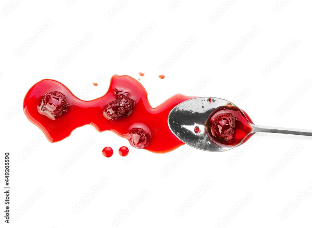 Spoon with tasty cherry jam on white background