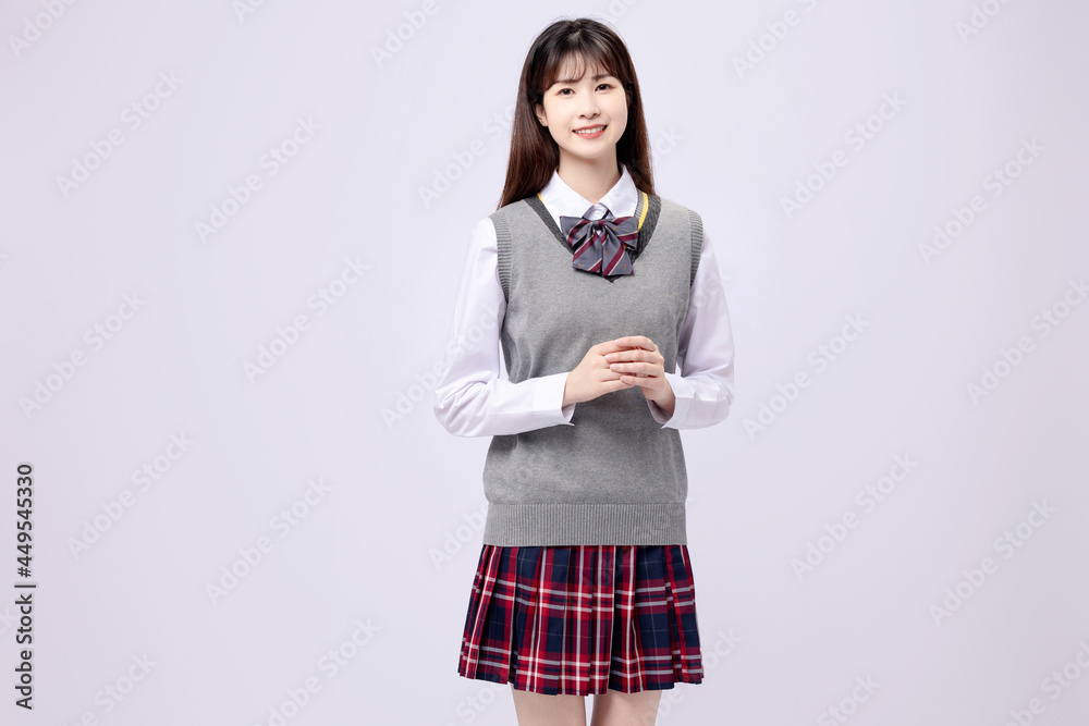 Beautiful Asian girl in middle school uniform