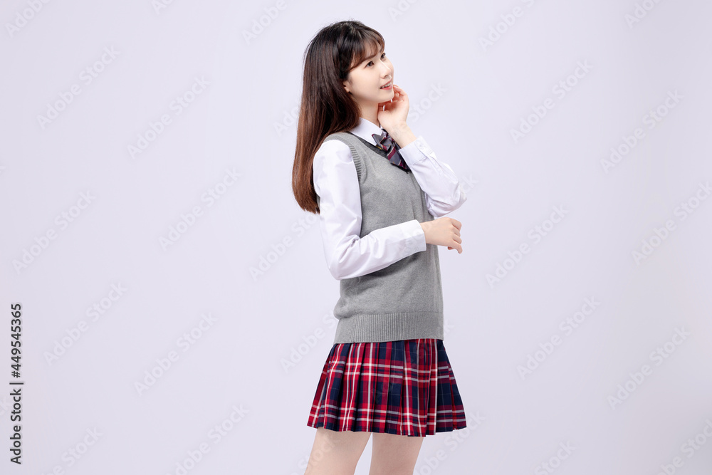 Beautiful Asian girl in middle school uniform