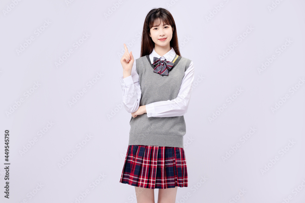 Beautiful Asian girl in middle school uniform