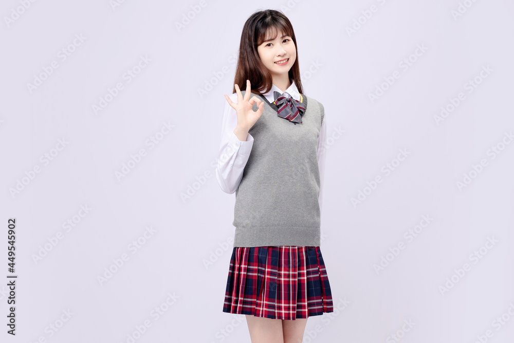 Beautiful Asian girl in middle school uniform