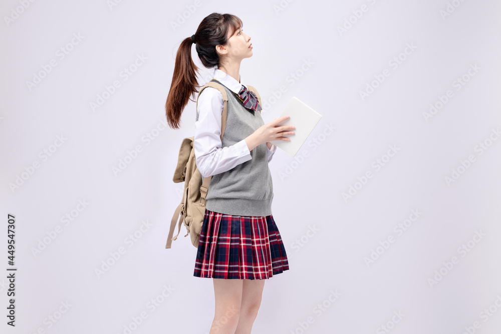 Beautiful Asian girl in middle school uniform