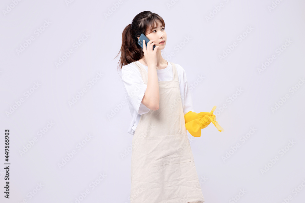 Beautiful asian woman cleaning