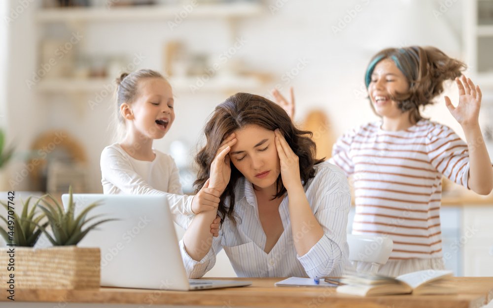 woman working on a laptop at home