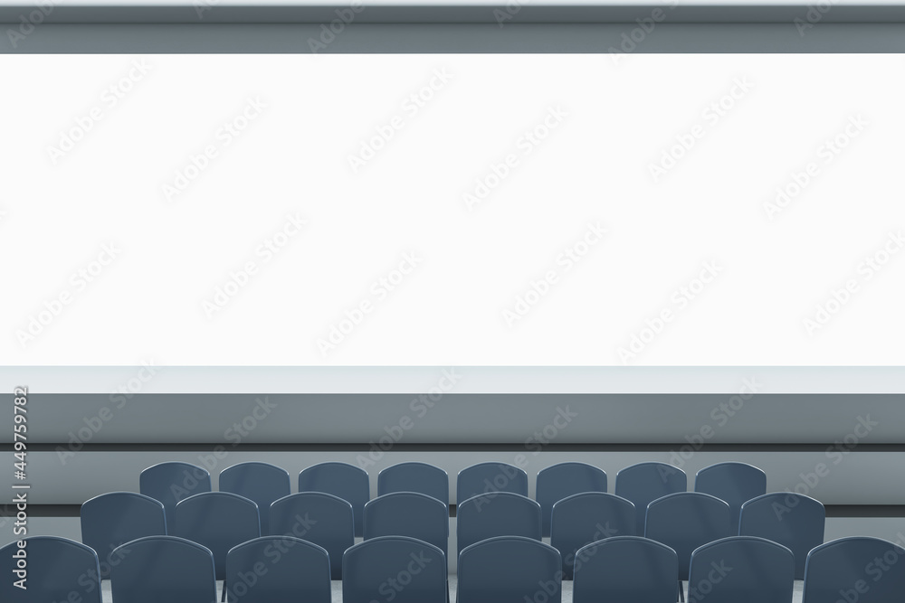 Clean grey auditorium with seating and empty screen with mock up place for your advertisement. Show 