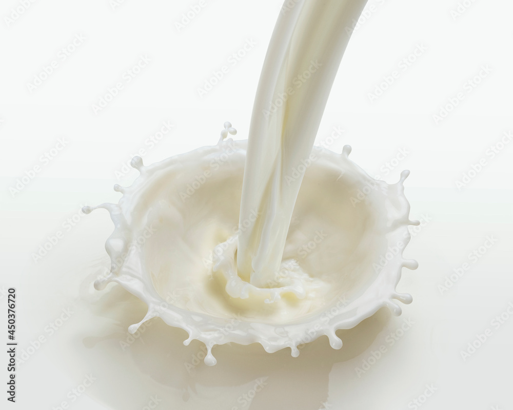 Pouring milk splash isolated on white background