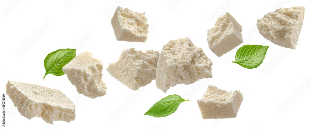 Sliced feta, diced curd cheese isolated on white background