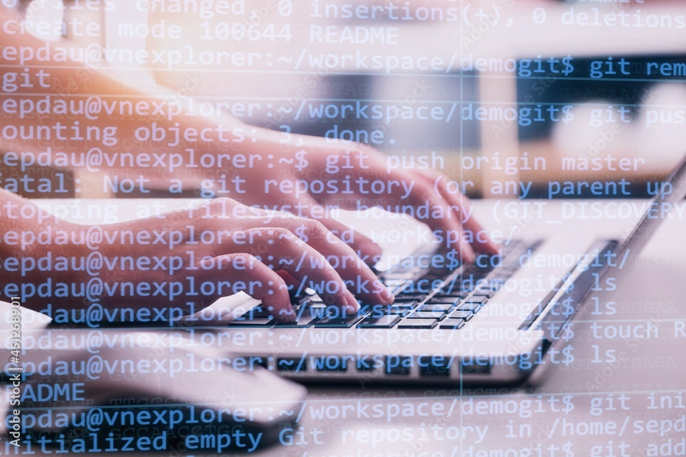 Human hands working on laptop on office desk