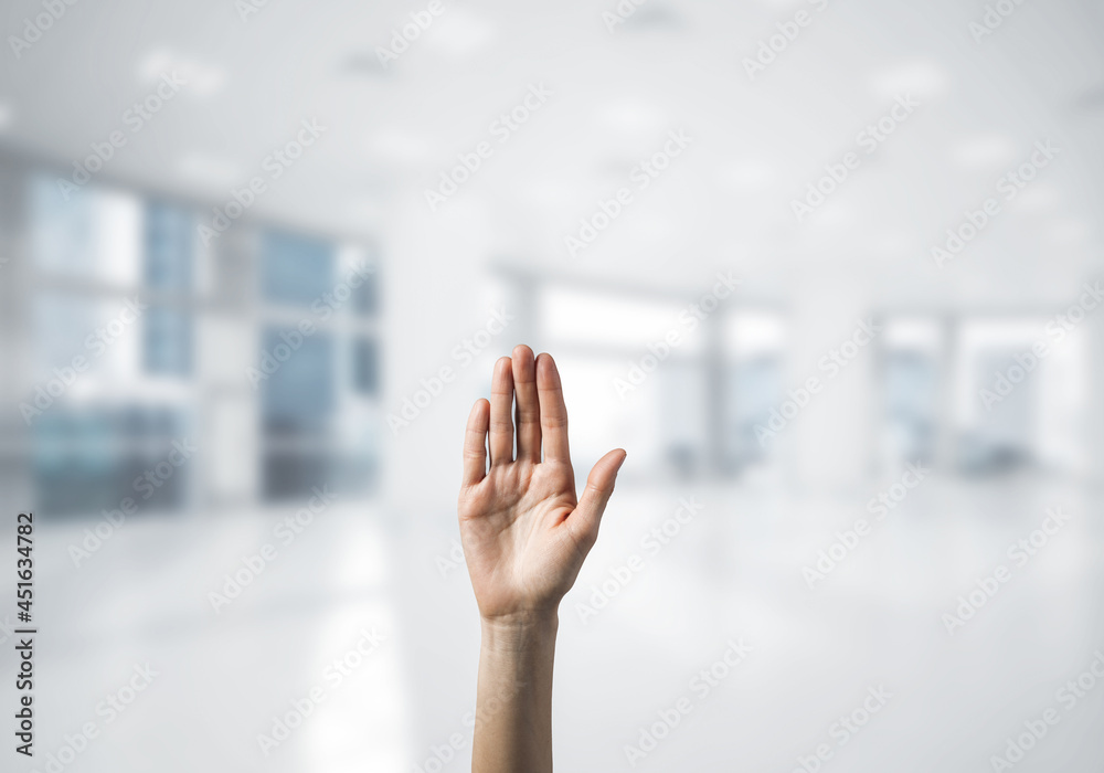 Choosing gesture of person in elegant modern interior in sunshine light