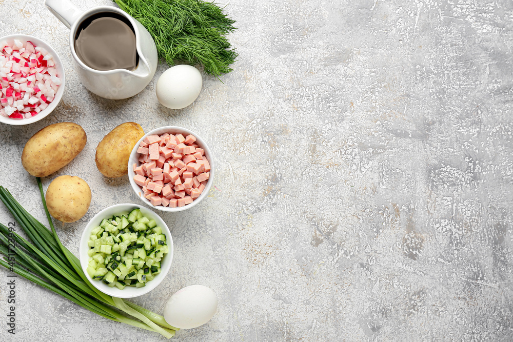 Different ingredients for okroshka on light background