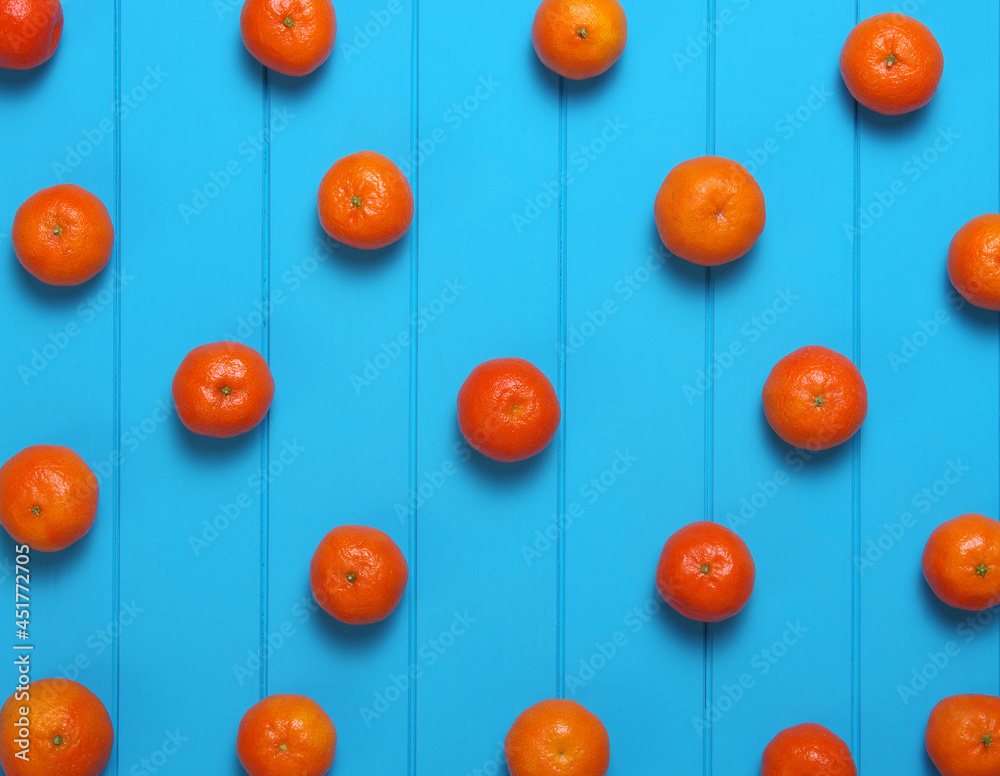 Orange on wooden background.