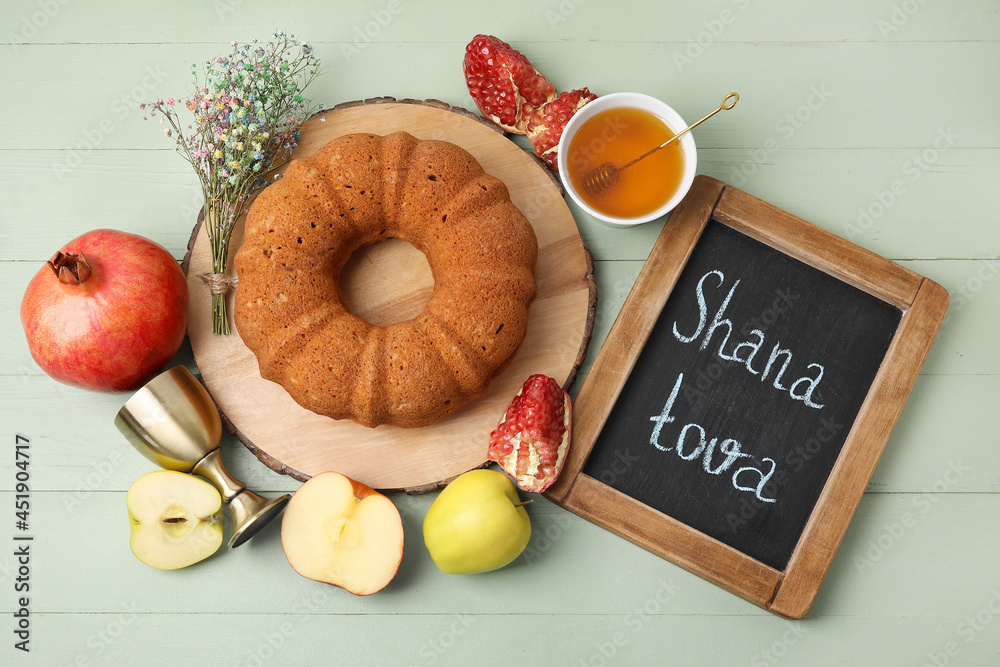 Composition for Rosh Hashanah (Jewish New Year) celebration on color wooden background