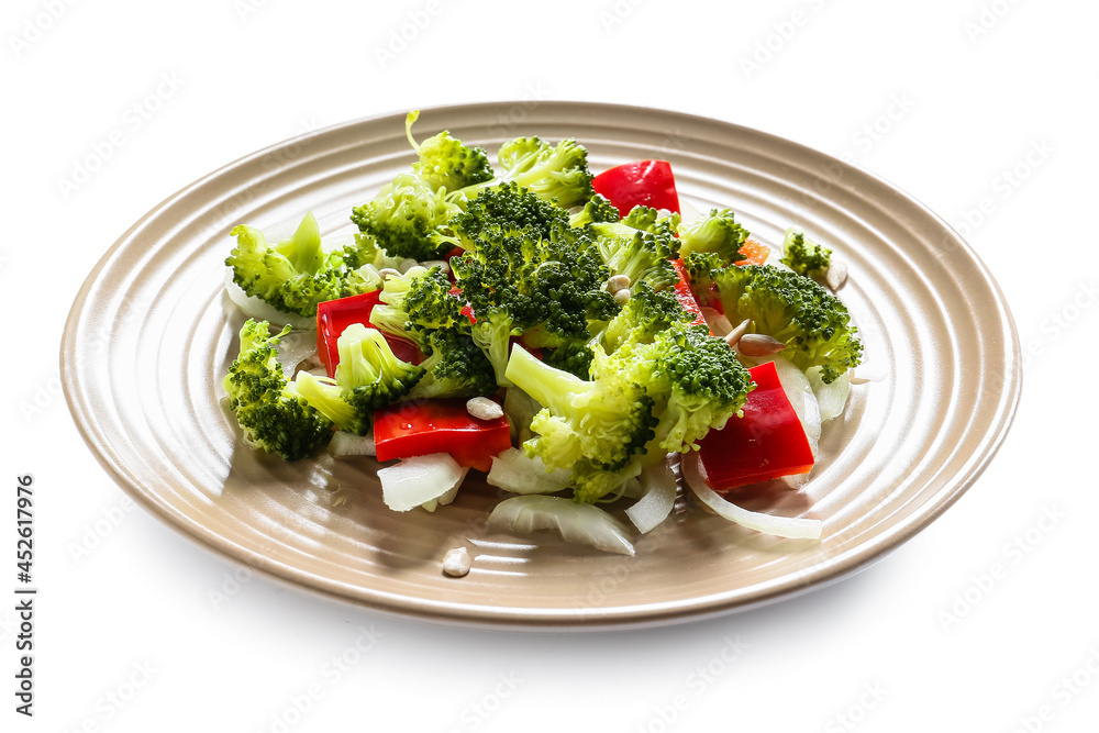 Plate of tasty salad with broccoli on white background