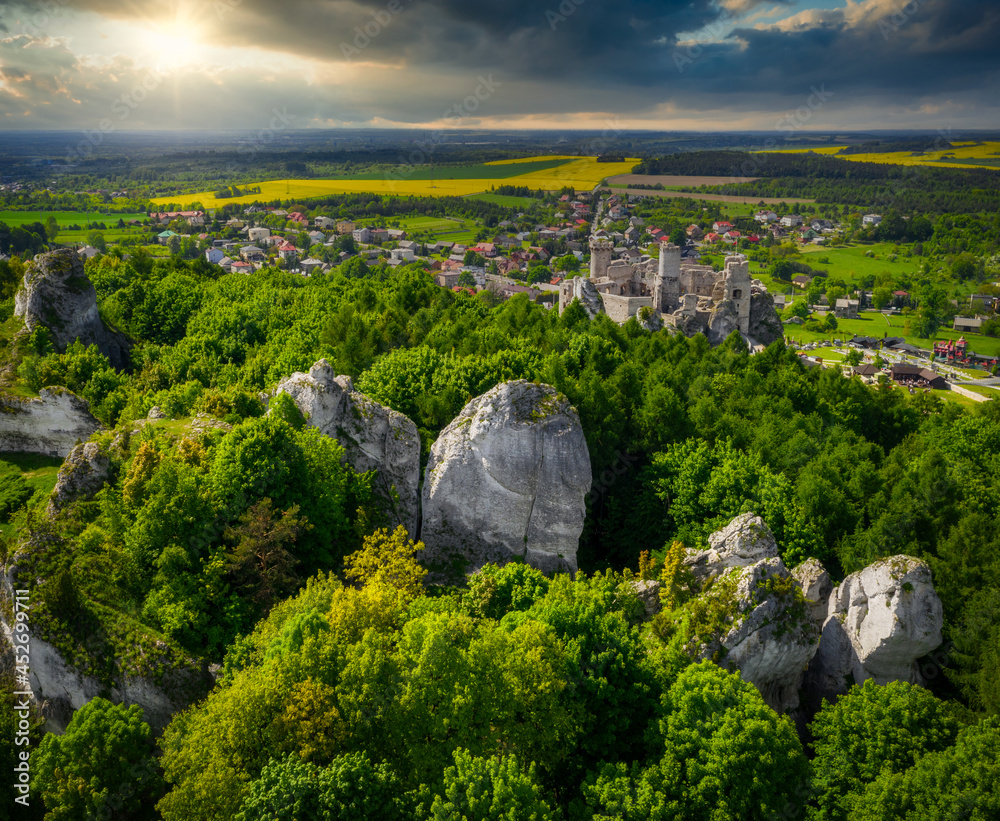 Ruins of beautiful Ogrodzieniec Castle in Poland at sunset.