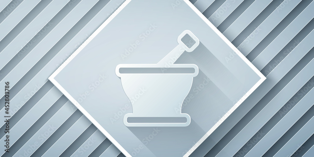 Paper cut Mortar and pestle icon isolated on grey background. Paper art style. Vector