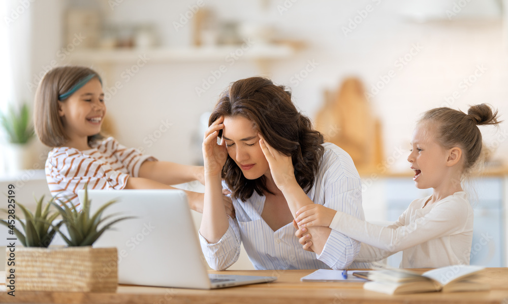 woman working on a laptop at home