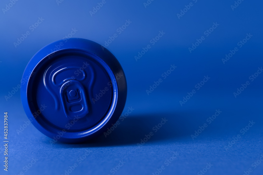 Can of soda on color background