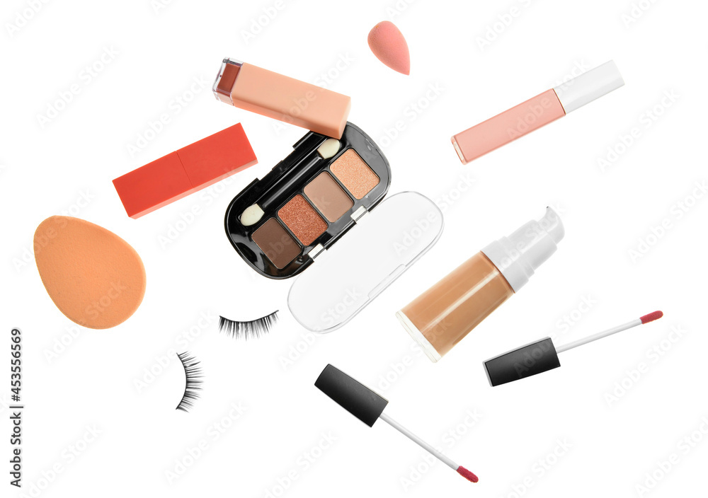 Set of makeup cosmetics and accessories on white background